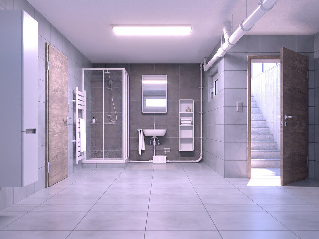 Impianto Kleinhenbe Minilift S installato successivamente in un bagno al piano interrato.